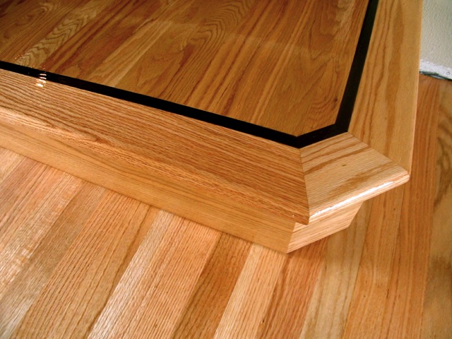 ebony feature strip in red oak landing