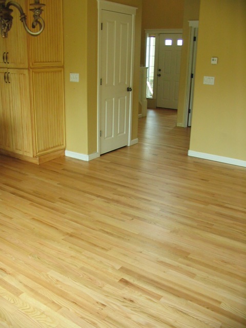 red oak with 3 coats water-base satin natural.